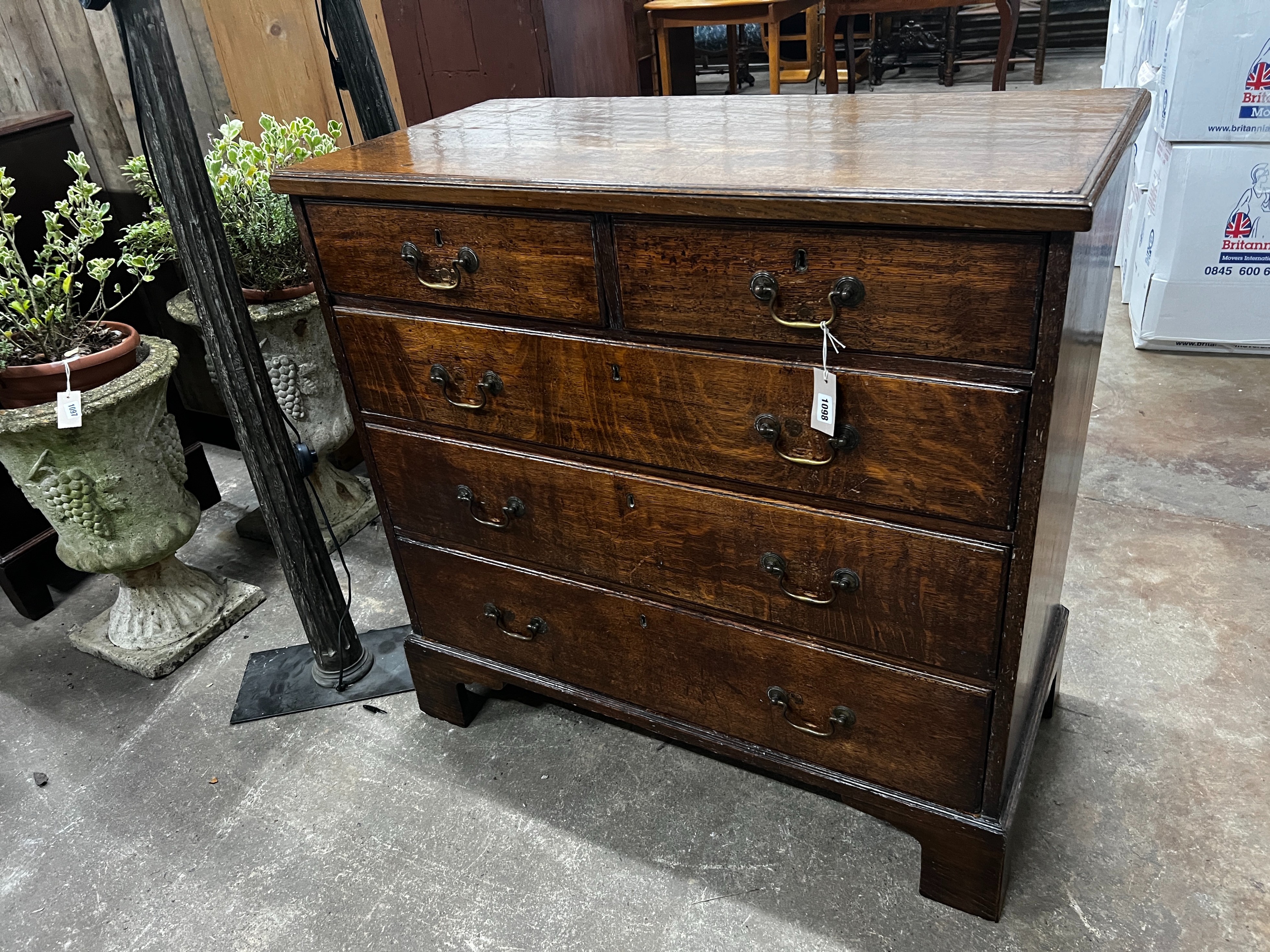 A George III oak chest of drawers, width 101cm, depth 49cm, height 98cm